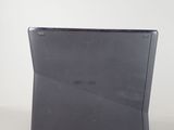 a black laptop computer sitting on a white surface