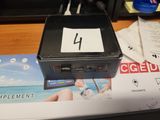a black box with a number on it sitting on a desk