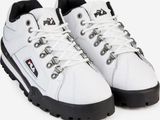 a close up of a pair of white sneakers on a white background