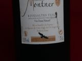 a bottle of wine that is sitting on a table