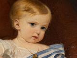 portrait of a young girl in a blue and white striped dress holding a teddy bear