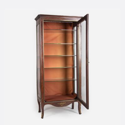 a wooden display cabinet with glass shelves and shelves in the middle