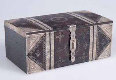 an image of a wooden box with a decorative design