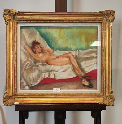 une peinture représentant une femme nue allongée sur un lit