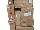 many boxes stacked on top of each other on a pallet