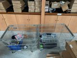 two metal cages that are sitting next to each other