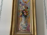 a painting of flowers in a vase on a wall