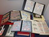 a lot of books that are sitting on a red table