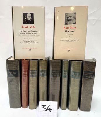 six books are stacked on top of each other on a white surface
