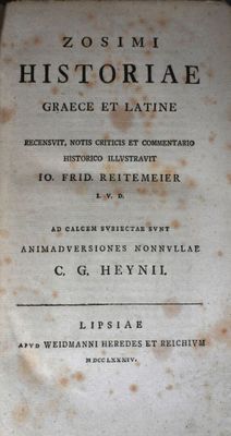 an old book that is sitting on a table