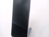 a cell phone that is sitting on a stand