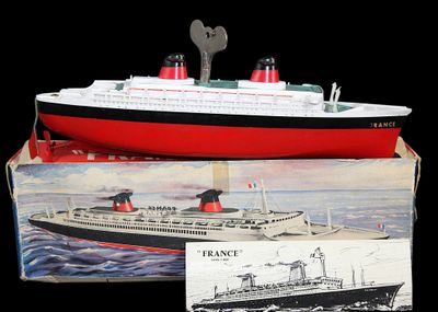 a model of a large boat in a box on a table