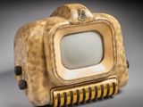 a small television that is sitting on top of a table
