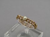 gold plated ring with a pearl bead and a chain