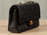 chanel black quilted lambskin flap bag with gold hardware