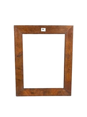 a wooden picture frame with a white background on a white background