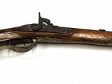an image of a very old gun on a white background