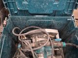 a blue tool box with tools inside of it