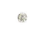 a close up of a diamond on a white surface