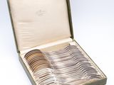 a box of silverware that is sitting on a table