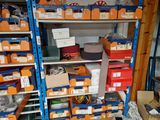 many boxes and boxes on the shelves in the room
