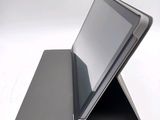 a tablet that is sitting on top of a stand