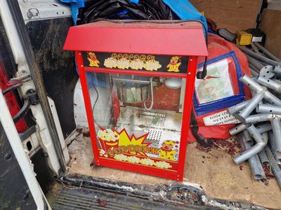 a machine that is sitting in the back of a truck