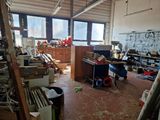 a room that has a lot of clutter in it