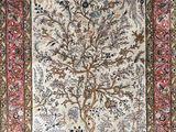 a rug with a tree of life on it