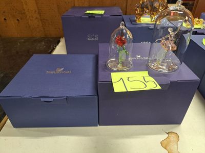 a lot of glass figurines sitting on a table