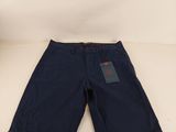 the children ' s shorts are blue and have a tag on it