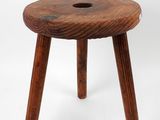an image of a wooden stool with a hole in the middle of it