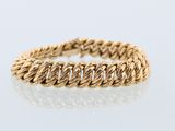 an 18k yellow gold ring with a twisted rope design
