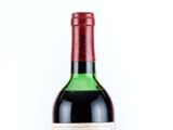 a bottle of wine that is sitting on a table