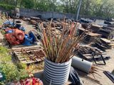 a potted plant in the middle of a pile of wood