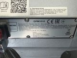 a close up of a machine with a qr code on it