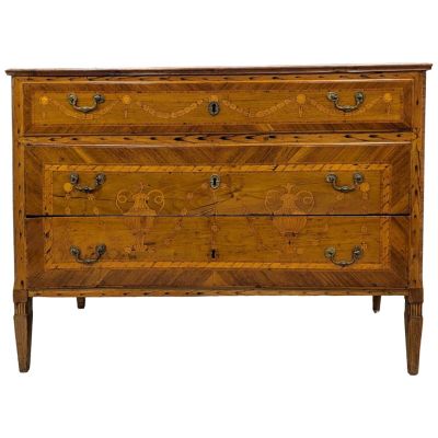a wooden chest of drawers with three drawers on each side