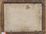an old wooden picture frame with a piece of paper taped to it