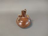 a small vase that is sitting on a table