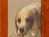 tableau représentant un chien, dans un cadre en bois, sur fond blanc