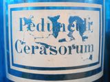 a close up of a blue bottle of cerasorn