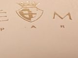 a close up of a sign on the wall of a building