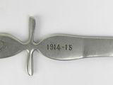 a small knife with a long blade on it