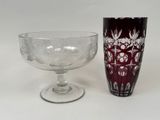 two wine glasses sitting next to each other on a table