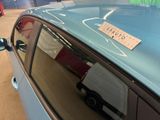 a car that has a sticker on the side of it