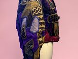 an image of a mannequin head with a colorful scarf on it