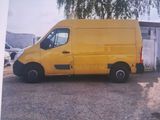a picture of a yellow van parked in a parking lot