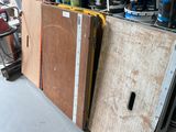 many different types of tools on the shelves in the garage
