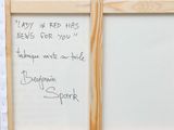 a white board with writing on it next to a window