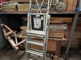 a ladder that is sitting in the middle of a room